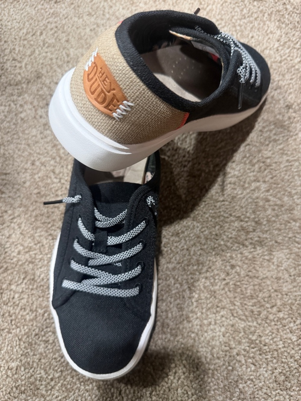 Hey Dude Black Canvas Sneakers with Tan Heel Patch and White Soles